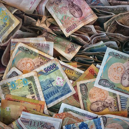 Vietnamese money, crumpled bills. Backgroundの写真素材