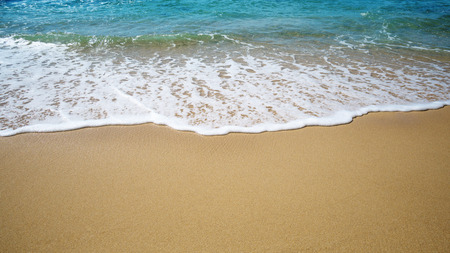 The tide line at the beachの写真素材