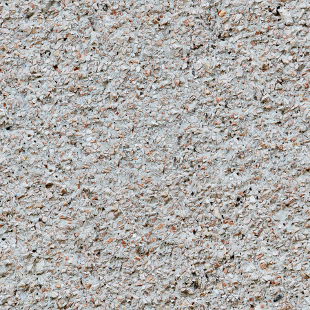 Background of crushed stone close up. Small stones background. Seamless pattern for designの写真素材