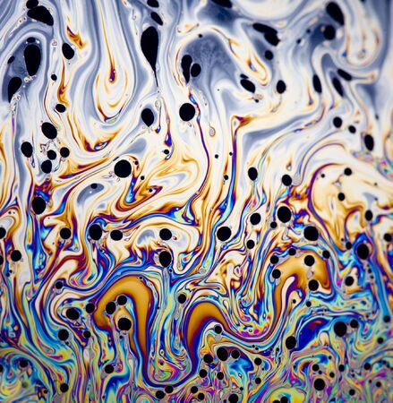 Psychedelic Abstract Macro of the oily surface of a soap bubbleの写真素材