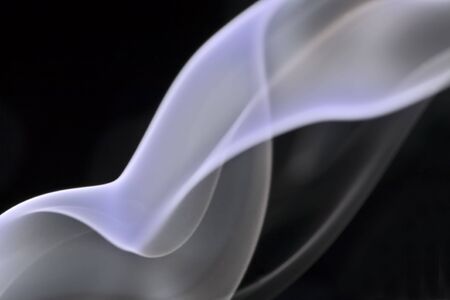 Very tight macro image of a whisp of smokeの写真素材