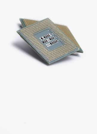 Two computer proccessor chips isolated on white with copy spaceの写真素材