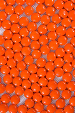 Background from set of tablets of orange colourの写真素材