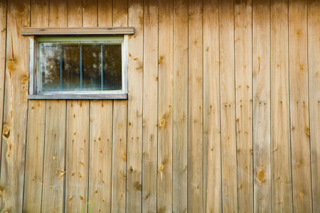 wall of the old boards with a window