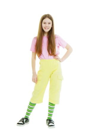 Teen girl in a bright summer clothes on the isolated white background
の写真素材