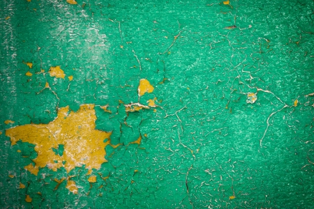 painted green wall cracked paint  The texture of old wallの写真素材