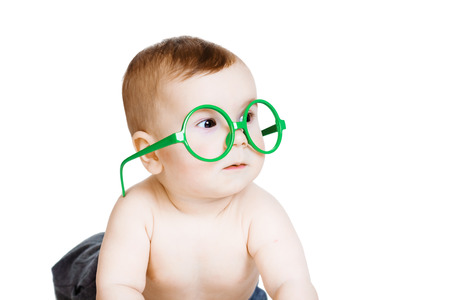 Little baby boy in the big funny glasses. の写真素材