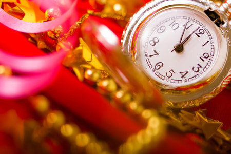 Christmas card. Beautiful background with a clock and decorations. macro