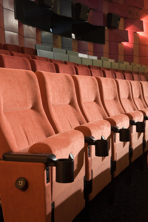 PR (property release) available. Empty cinema auditorium with line of chairs.の写真素材