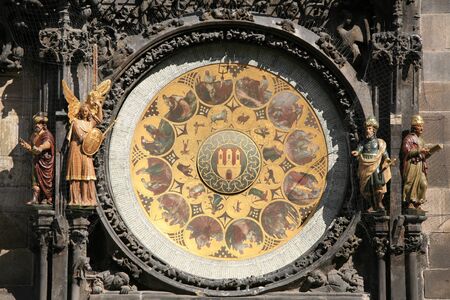 Unique clock on gothic tower supplemented with a round calendarium including the signs of the zodiac painted by Josef Manes (1865).の写真素材