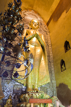 Gold Buddha statue in Ananda temple, Bagan, Burma.のeditorial素材