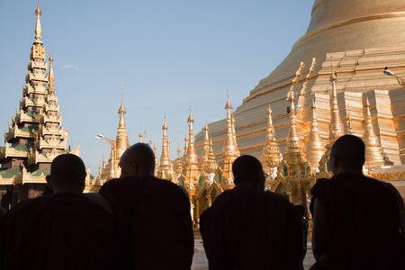 Monks in the biggest Buddhist temple Shwedagon pagoda, Rangoon, Burma.のeditorial素材