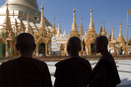 Monks in the biggest Buddhist temple Shwedagon pagoda, Rangoon, Burma.のeditorial素材