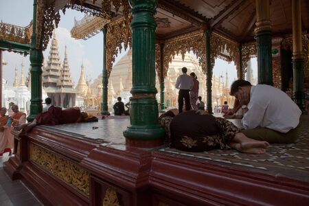 Interior of the biggest Buddhist temple Shwedagon pagoda, Rangoon, Burma.のeditorial素材