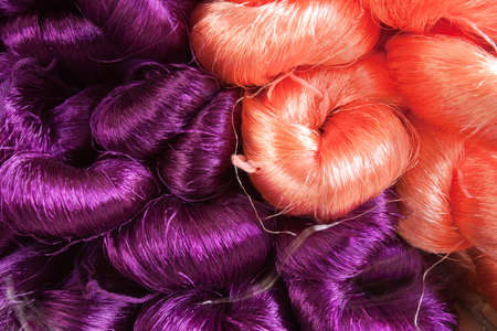 Close-up of yarn colored by nature colors ready for sale.の写真素材