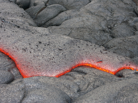Flowing lava on volcano field. Hawaii, Big Islandの写真素材