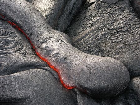 Flowing lava on volcano field. Hawaii, Big Islandの写真素材