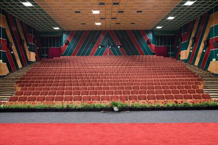 PR (property release) available. Empty cinema auditorium with line of chairs. Front view.の写真素材