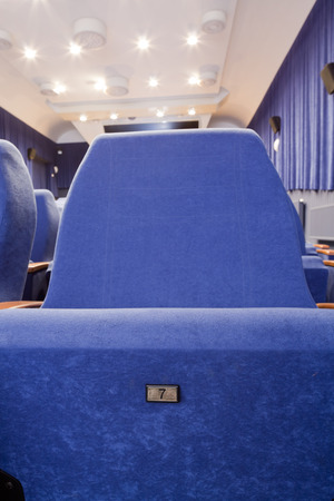 PR (property release) available. Empty cinema auditorium with line of chairs. Front view.の写真素材