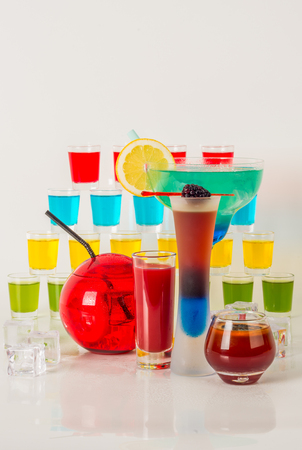 Colorful set of drinks, color drink decorated with fruit, many color kamikaze drink, shot drinks, party setの写真素材