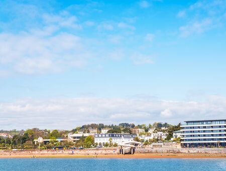 beautiful bay over the ocean, in the background beach and a seaside town, promenade, sunny dayの写真素材