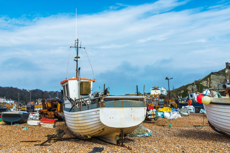 Fishing boats on the shore, pebble beach, wooden boats, fishing and tourist industry, seaside townの写真素材