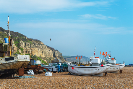Fishing boats on the shore, pebble beach, wooden boats, fishing and tourist industry, seaside townの写真素材