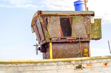 Fishing boats on the shore, pebble beach, wooden boats, fishing and tourist industry, seaside townの写真素材