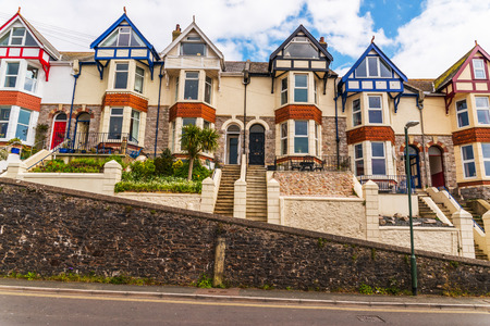 Typical English architecture, residential buildings in a row along the street, seaside townの写真素材