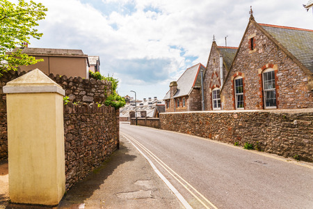 Typical English architecture, residential buildings in a row along the street, seaside townの写真素材