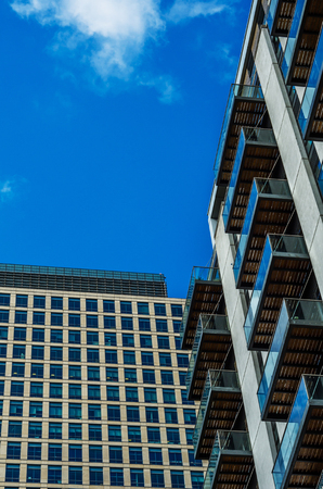 Modern business skyscrapers, high glass buildings, modern architecture, commercial buildings, sunny dayの写真素材