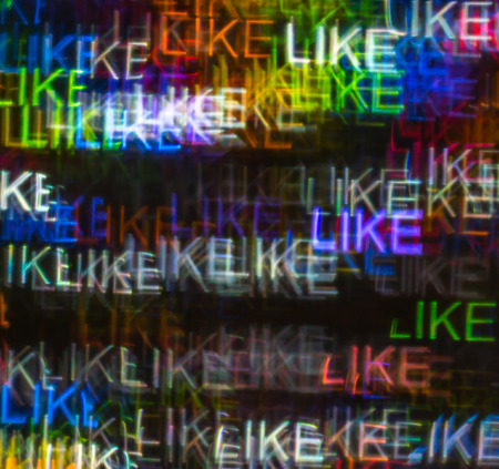 Beautiful background with different colored word like, abstract background, like shapes on black background, blurryの写真素材