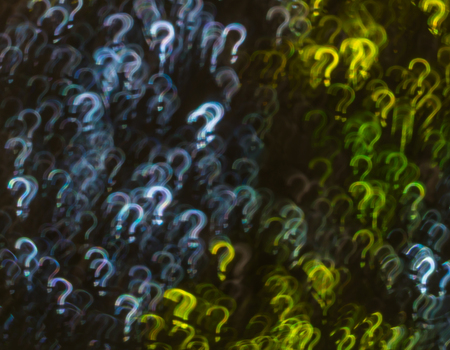 Beautiful background with different colored question markの写真素材