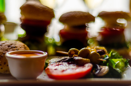 Set with different appetizers in small portions, healthy and delicious snacks, diet foodの写真素材