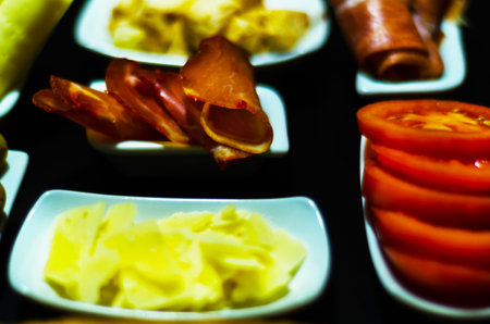 Set with different appetizers in small portions, healthy and delicious snacks, diet foodの写真素材