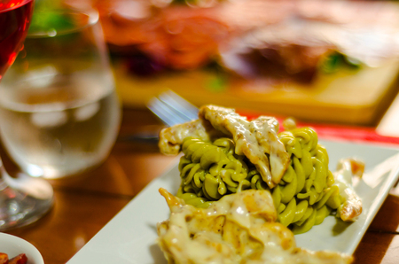 tasty dish with pasta, meat and sauce, Italian dish, fast and simple dish, lunch or dinnerの写真素材
