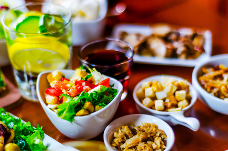 Set with different appetizers in small portions, healthy and delicious snacks, diet foodの写真素材