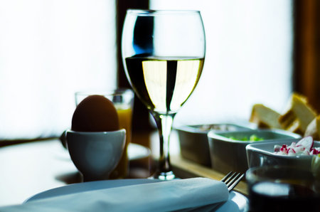 Breakfast set with egg in egg-cup, fresh bread, healthy and tasty food in the morning, breakfastの写真素材