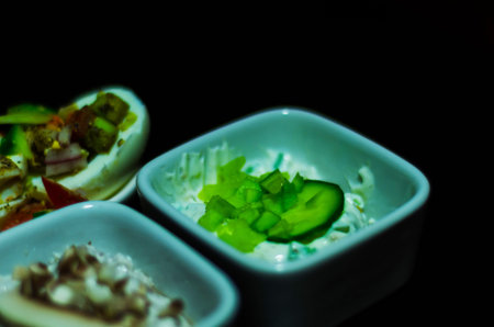 set of snacks with white cheese and cucumber, radish, mushroom, healthy and tasty snacks, breakfast...