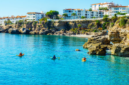 Senior kayaker on a kayak by the sea, active water sport and leisure, kayakingの写真素材