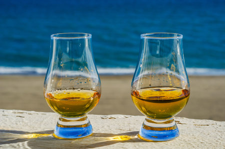 single malt whisky  in the glass, luxurious tasting glass, tasty setの写真素材