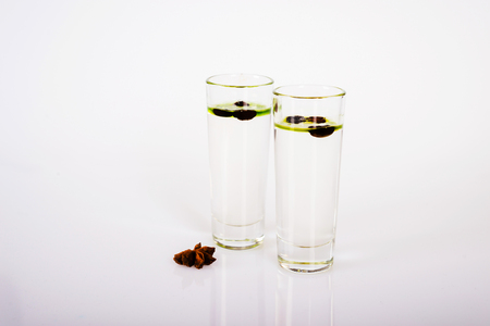 aromatic anise alcohol with coffee beans in a glass, drink set, party drinkの写真素材
