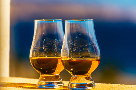 Single malt whisky in the glasses, luxurious tasting glass, tasty setの写真素材