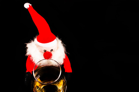 Santa Claus with single malt whiskey glass, Symbol of Christmas holiday, Xmas set, decorationの写真素材