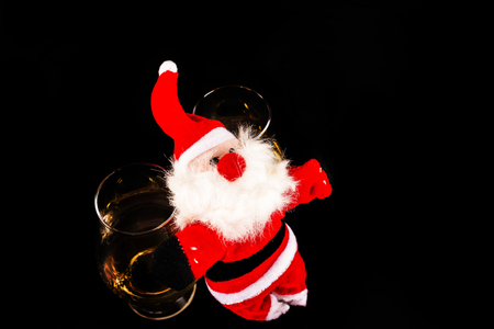 Santa Claus with single malt whiskey glass, Symbol of Christmas holiday, Xmas set, decorationの写真素材
