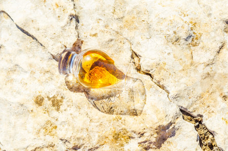 Single malt whisky in glass on the rock, drink on a natural stone, tasty setの写真素材
