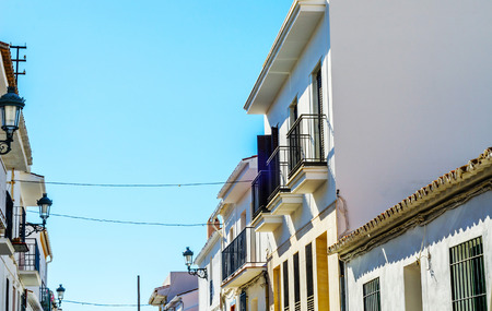 Stylish balcony with a metal railing, solid architectural element, a place of rest and relaxation, vintage decor, balconyの写真素材