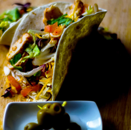 Tasty fresh wrap sandwich with meat, vegetables and cheese, delicious snack, healthy foodの写真素材