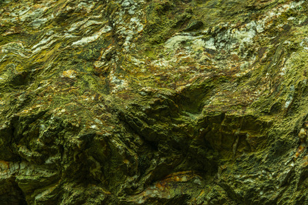 interesting textura with stone rocks, beautiful background, rock wall, ragged stone, mineral materialの写真素材