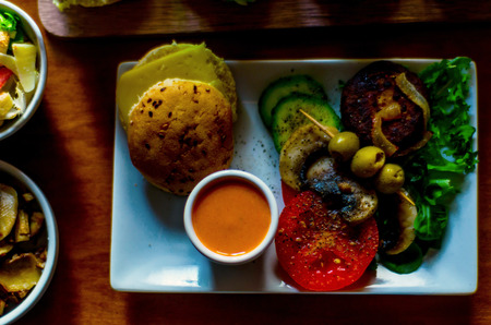 Set with different appetizers in small portions, healthy and delicious snacks, diet foodの写真素材